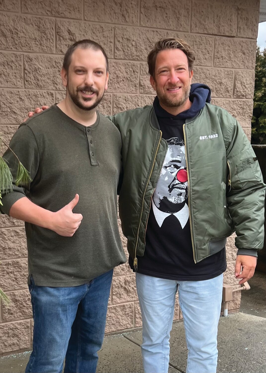 PIZZA PRAISE: Eric Palmieri, of D. Palmieri’s Bakery in Johnston, poses for a photo with Barstool Sports and One-Bite pizza reviewer Dave Portnoy after the social media celebrity stopped by for a bite last week.
